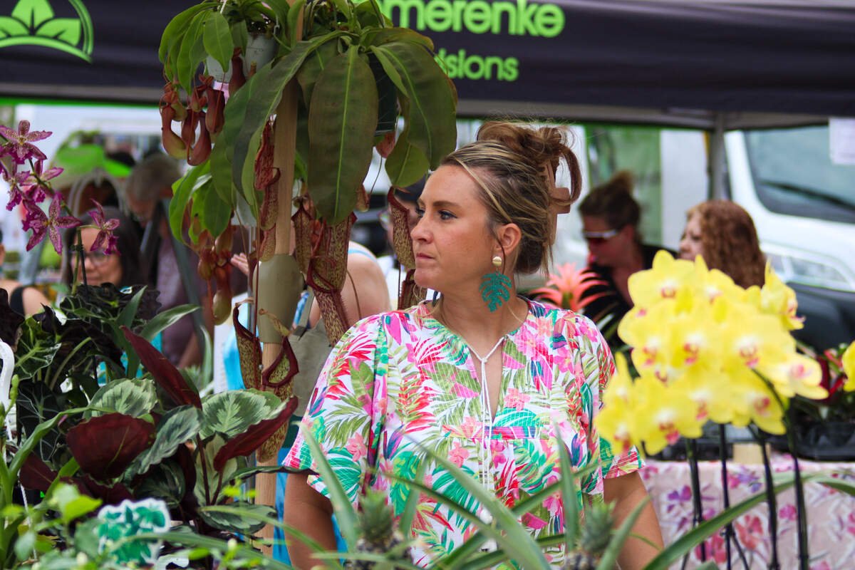 Vashti Kern of Bird’s Botanicals talks to shoppers at the Overland Park Farmer’s Market on June 6, 2026.