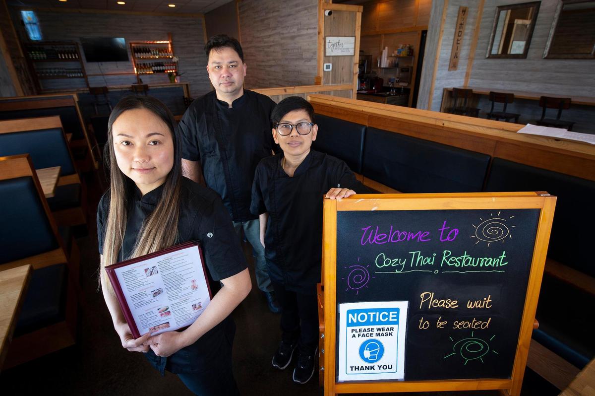 Owners Nisana Sunvijit, from left, Chalit Srimueang and Natchayut Darawong are opening Cozy Thai restaurant at 1032 W. 103rd St.