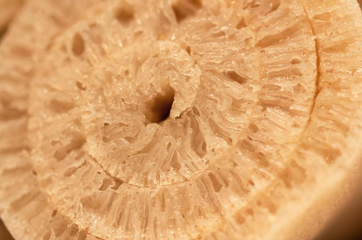 Injera, a light, spongy, flat bread, is served with most Ethiopian dishes. Diners eat with their hands using the slightly nutty-tasting bread as a utensil.