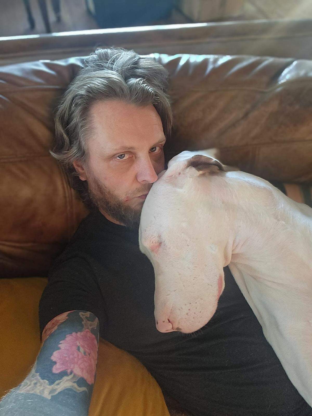Kansas City designer Christian Micheal Shuster and his rescued Great Dane, Willow.