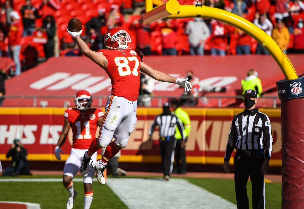 Kansas City Chiefs tight end Travis Kelce celebrates his second quarter touchdown against the New York Jets by dunking the ball over the goalpost on November 1, 2020, at Arrowhead Stadium in Kansas City. Former Chiefs tight end Tony Gonzalez used to celebrate in the same way.