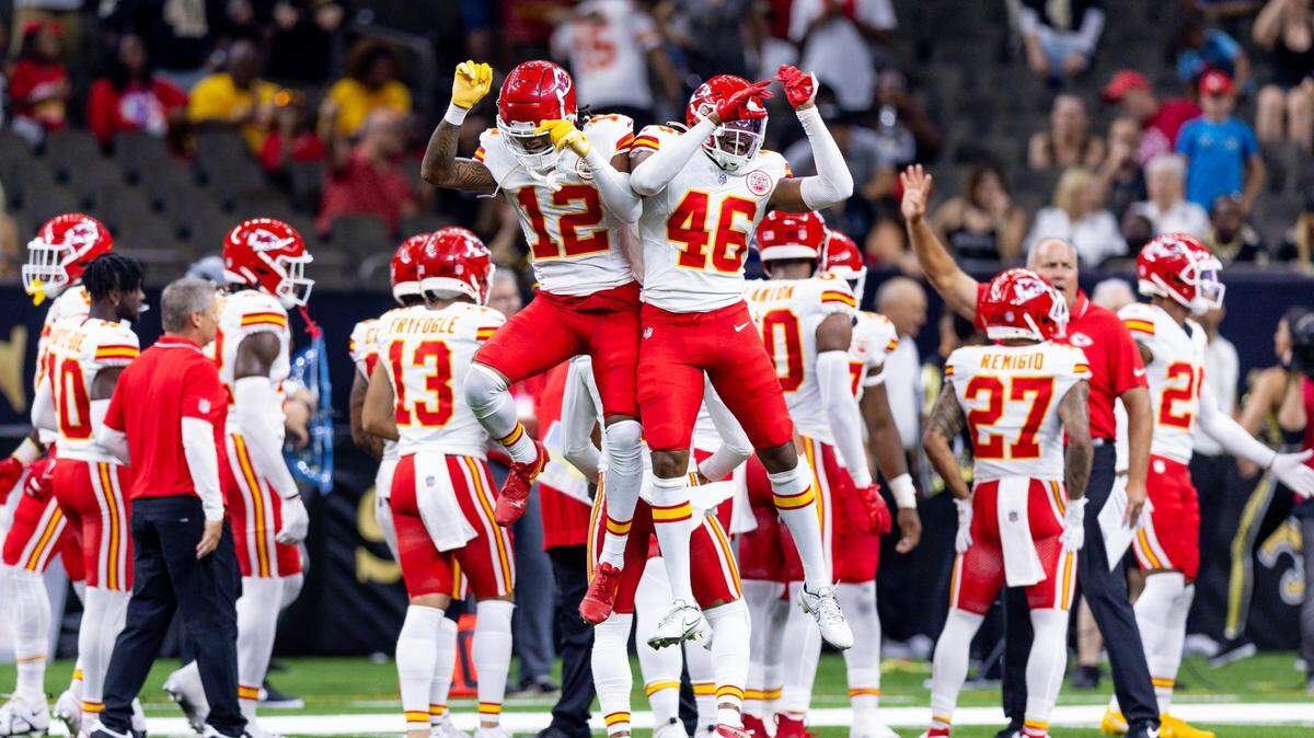 Rookie Kansas City Chiefs cornerback Kahlef Hailassie (No. 12) and rookie safety Isaiah Norman (No. 46) celebrate an interception against the New Orleans Saints on Sunday at the Caesars Superdome.