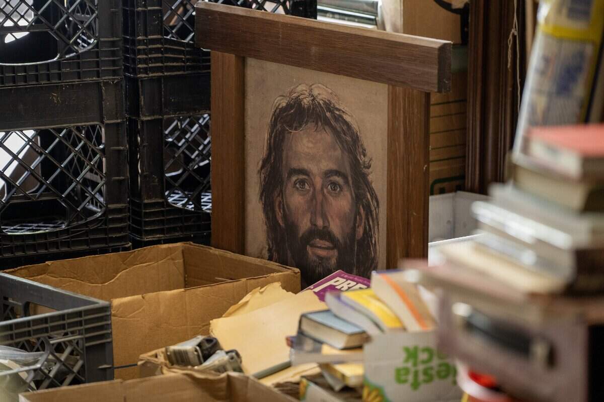 A painting is seen among stacks of books at Steel's Used Books on Tuesday, June 23, 2026, in Kansas City.