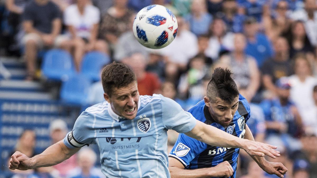 Sporting Kansas City’s Matt Besler (left) is the club’s all-time leader in appearances.