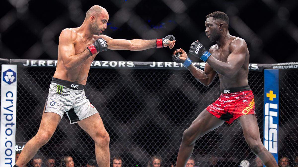 UFC featherweights Giga Chikadze, left, and David Onama, right, during their bout at the T-Mobile Center in Kansas City on Saturday night during UFC Fight Night: Machado Garry vs. Prates. Onama went on to win the fight.