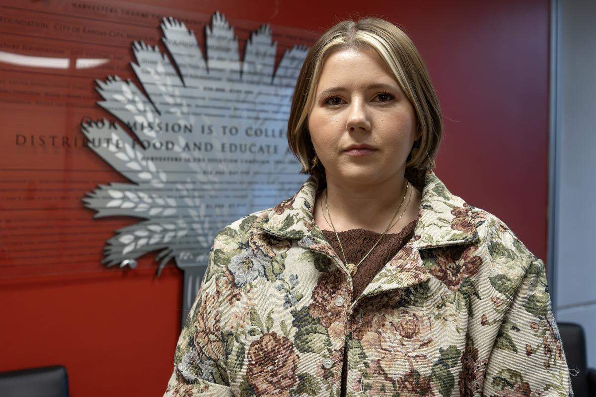 Elizabeth Keever, chief resource officer at Harvesters, stands for a portrait in the lobby of the organization’s headquarters Tuesday, Oct. 28, 2025, in Kansas City.