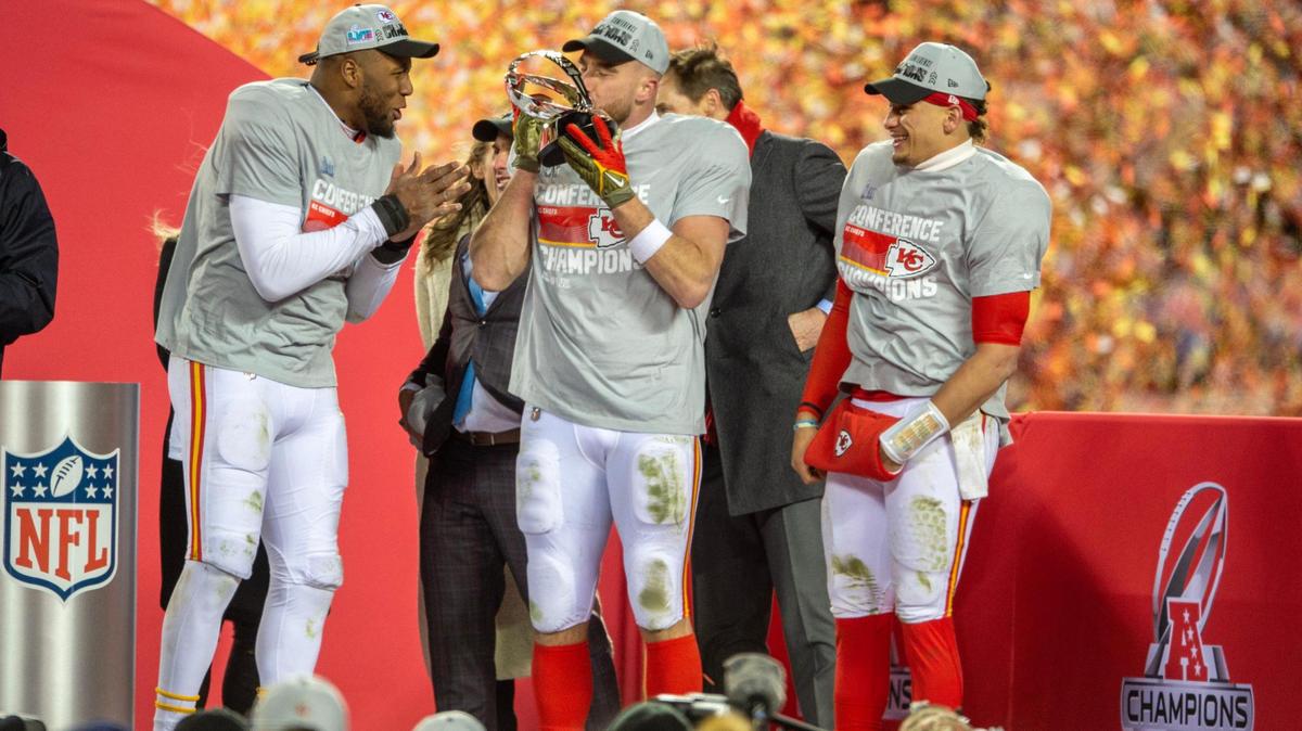 Kansas City Chiefs defensive end Carlos Dunlap, left, tight end Travis Kelce and quarterback Patrick Mahomes celebrate after winning the AFC Championship Game against the Cincinnati Bengals at GEHA Field at Arrowhead Stadium on Sunday, Jan. 29, 2023, in Kansas City.