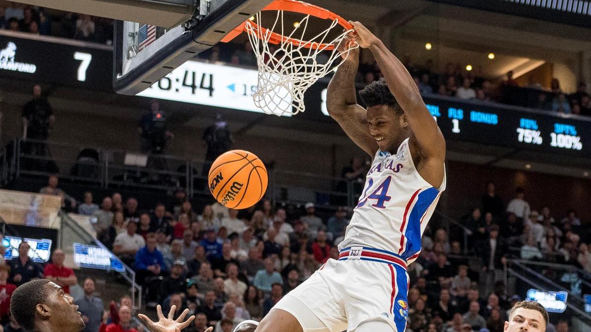 Kansas Jayhawks forward K.J. Adams (24) dunks the ball against the Samford Bulldogs during a men’s college basketball game in the first round of the NCAA Tournament on Thursday, March 21, 2024, in Salt Lake City, Utah.