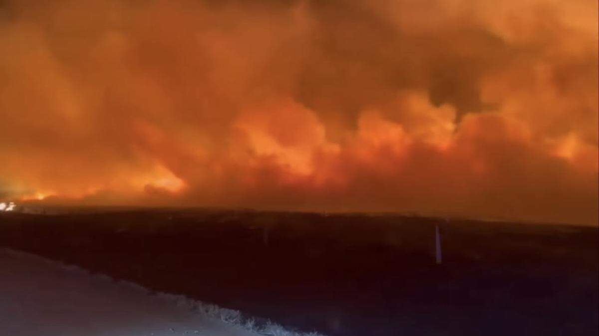 Videos and images of the wildfire that scorched southwest Kansas this week popped up on social media showing glimpses of the massive effort it took to contain it. This shows the fire as it began traveling into Kansas from Oklahoma on Tuesday.