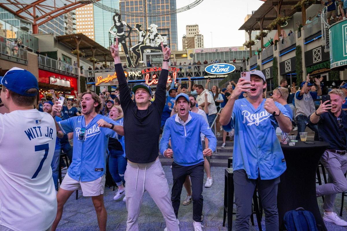 Royals fans celebrated at the Kansas City Power & Light District as the Royals defeated the Baltimore Orioles, 2-1, to win the Wild Card series in Baltimore on Wednesday, October 2, 2024. The Royals advance to the ALDS, where they will face the Yankees in New York on Saturday.