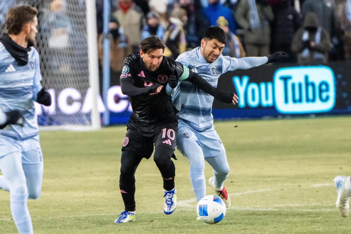 Inter Miami CF forward Lionel Messi tackles the ball away from a Sporting KC player in the first half of the Concacaf Champions Cup match of Sporting KC vs. Inter Miami CF on Wednesday, Feb. 19, 2025, at Sporting Park. Messi scored the lone goal of the match.