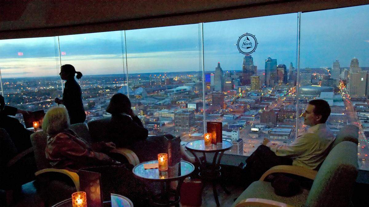 Back in November 2010, Craig Williams, right, of Kansas City waits for his drink with friends at Skies restaurant with a view of downtown.