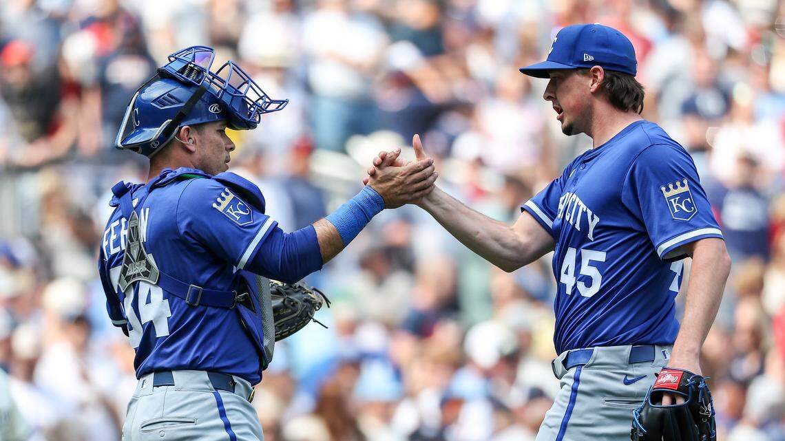 Kansas City Royals pitcher Taylor Clarke (45) and catcher Freddy Fermin (34) celebrate their teams win against the Minnesota Twins during the tenth inning at Target Field on May 25, 2025 in Minneapolis, Minnesota, USA.
