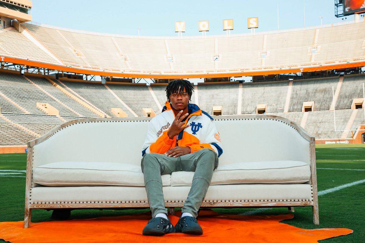 Lee’s Summit North’s Williams Nwaneri sits on a couch during his recent recruiting visit to the University of Tennessee.