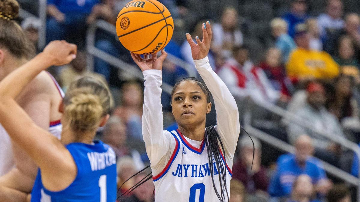 Kansas Jayhawks guard Wyvette Mayberry (0) attempts a 3-point shot in the second half during an NCAA women’s basketball game against the BYU Cougars in the Big 12 Tournament at T-Mobile Center on Friday, March 8, 2024, in Kansas City.
