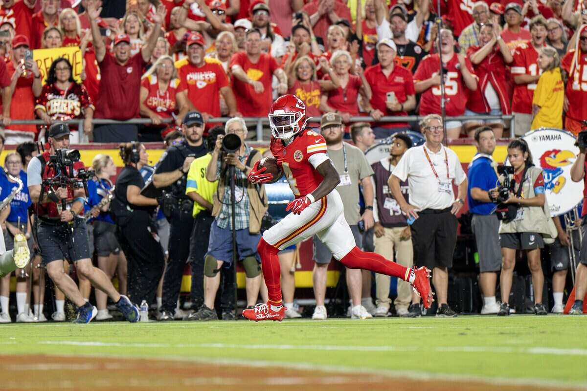 Kansas City Chiefs wide receiver Rashee Rice (4) scores a touchdown in the second quarter during the the season opener against the Denver Broncos at Arrowhead Stadium on Monday, Sept. 14, 2026, in Kansas City.