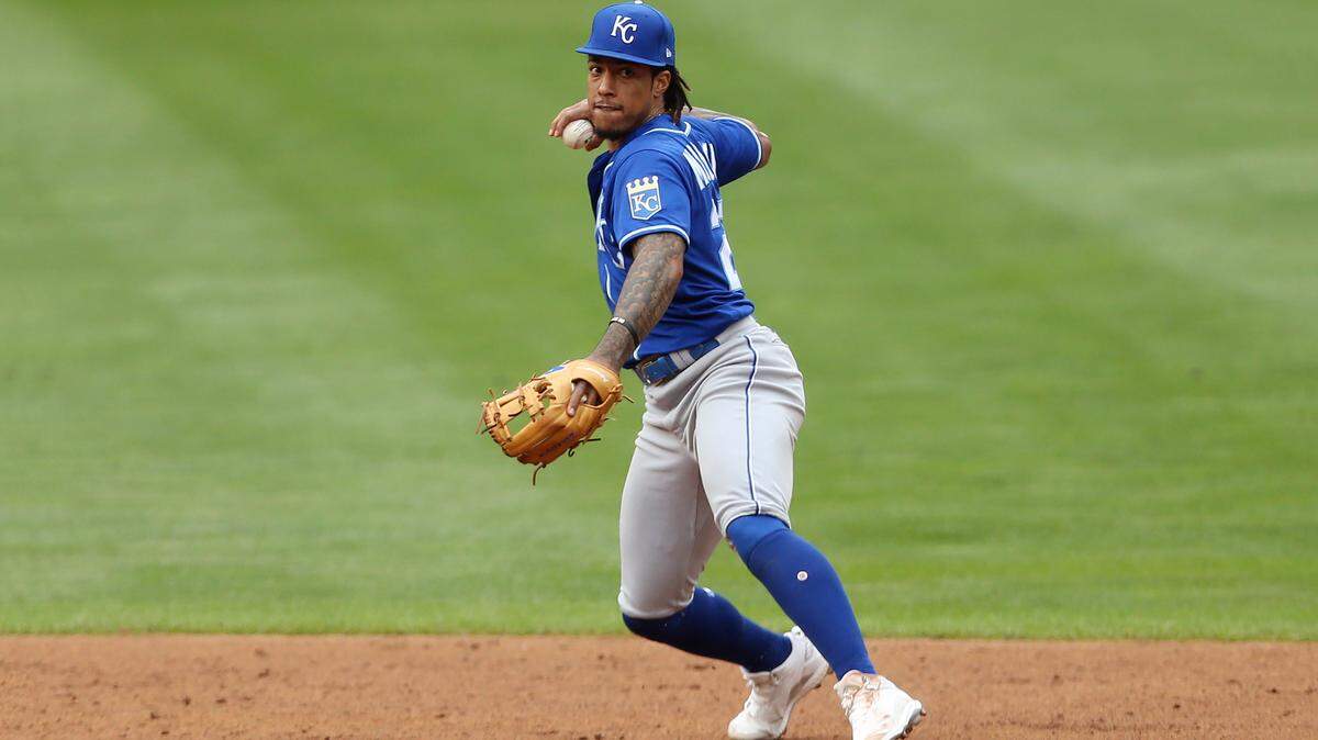 Kansas City Royals’ Adalberto Mondesi throws a ground ball hit by Minnesota Twins’ Rob Refsnyder to first baseman Carlos Santana for an out during the sixth inning of a baseball game Sunday, May 30, 2021, in Minneapolis. Kansas City won 6-3. (AP Photo/Stacy Bengs)