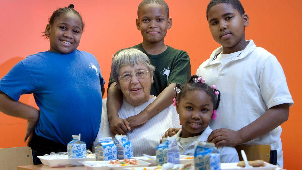 This 2011 photos show Sister Berta with some of the children from Operation Breakthrough who received the BackSnack, a backpack stuffed with food to help them supplement their daily diets when there was not enough food at home.