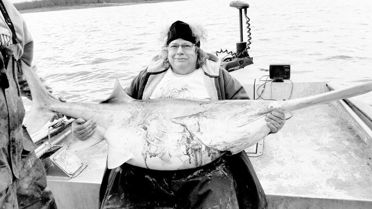 Missouri's Mary Corpening had been wanting to go fishing for spoonbill for 30 years. Her first time out, she caught a 90-pound giant.