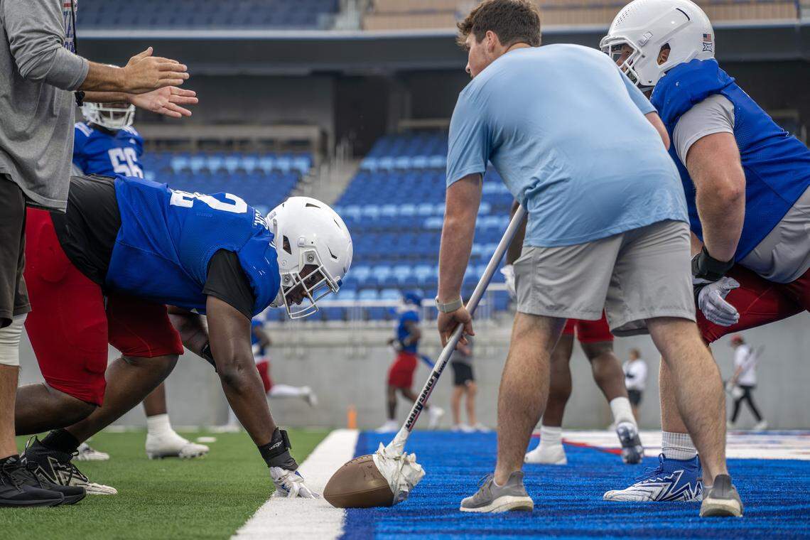 Kansas defensive tackle Tommy Dunn Jr. (92) performs a drill during practice at the newly renovated David Booth Kansas Memorial Stadium on Friday, Aug. 1, 2025, in Lawrence, Kansas.