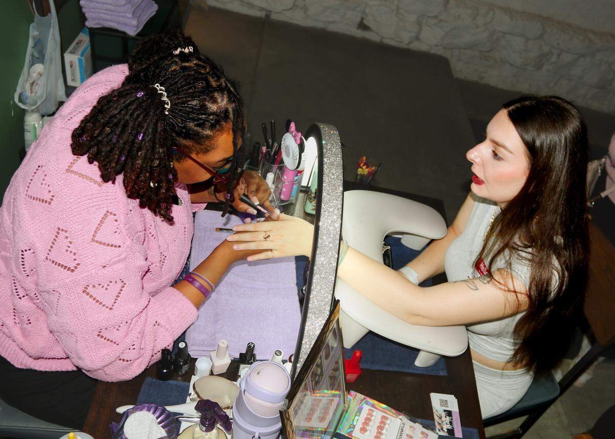 An attendee gets her nails done at the Feb. 13 Sincerely, Her, a Valentine’s Day-themed event curated Lauren Scott.