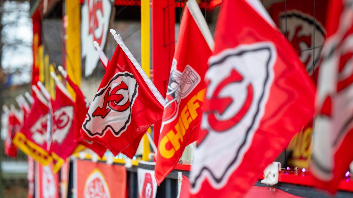 Flags adorn the front porch of Kansas City Chiefs super fan Dennis Basye’s home on Sunday, Feb. 4, 2024, in Sedgwick, Kansas. Basye, who has been collecting Chiefs merchandise for five years, annually enhances his house display with new additions.