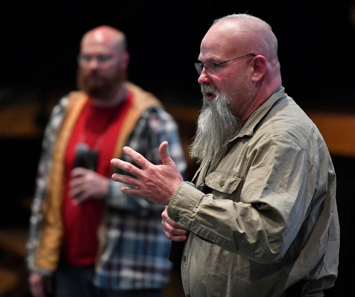 Sgt. Gary Blackwell, right, of the Clay County Sheriff’s Office Drug Task Force, spoke Wednesday night at a Community Drug Education Summit at Oak Park High School in the North Kansas City school district.