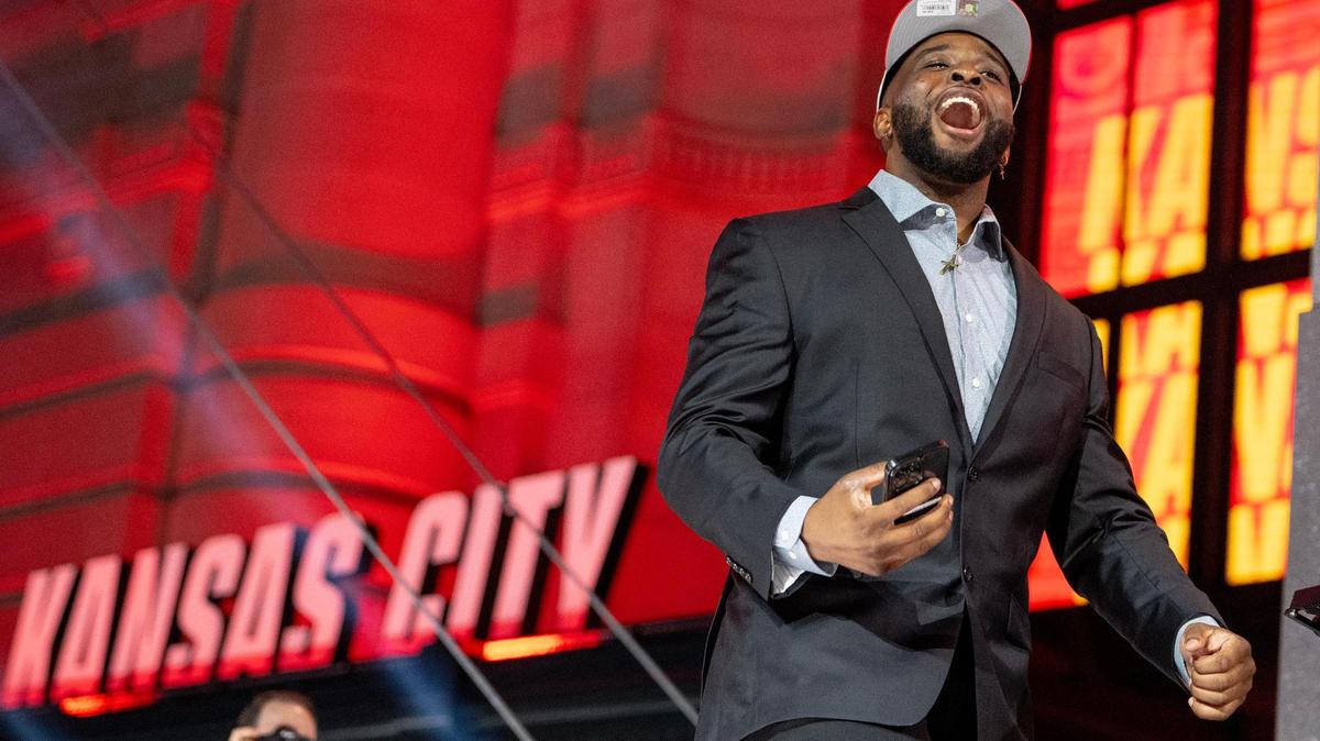 Kansas State defensive end Felix Anudike-Uzomah walks on stage during the second round of the NFL Draft outside of Union Station on Friday, April 28, 2023, in Kansas City. Anudike-Uzomah was selected 31st overall by the Kansas City Chiefs.