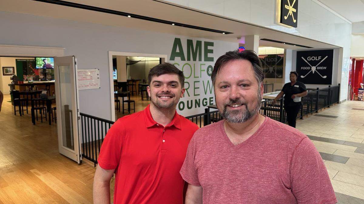 Cullen Graham, left, team leader at AME Golf & Brew Lounge, and founder Ryan Marshall.