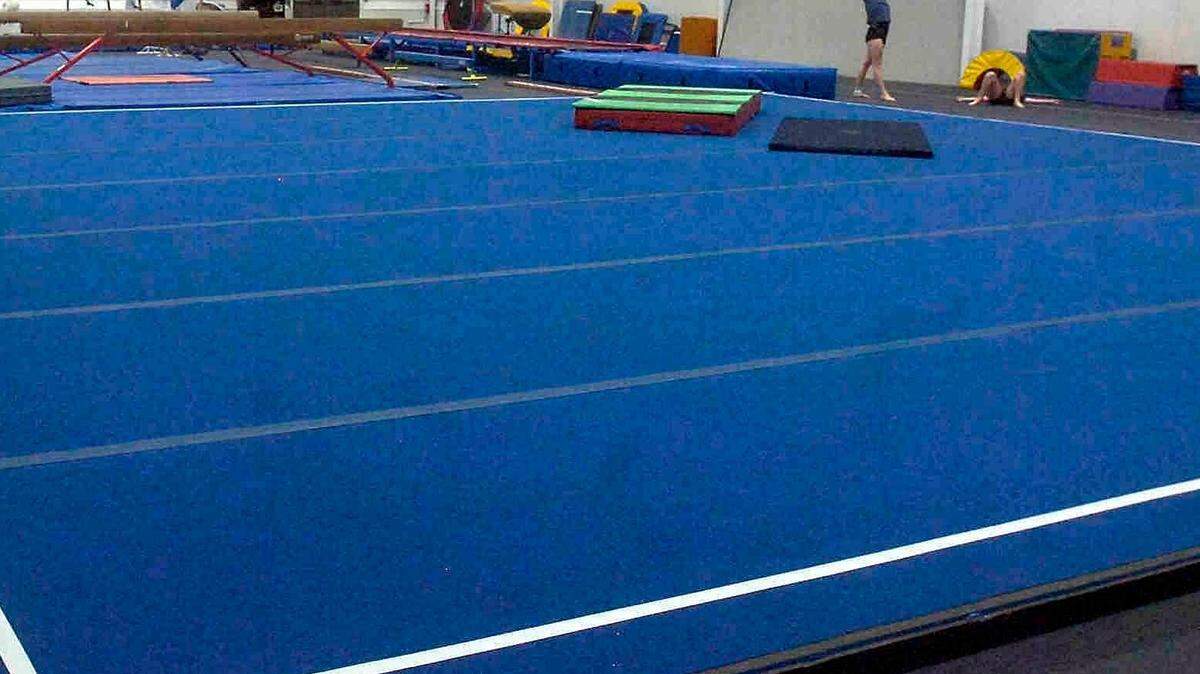 Olathe North rolled to a third straight state championship in Kansas high school gymnastics on Saturday in Newton.