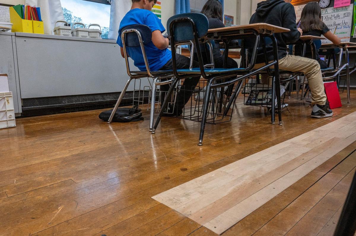 New wood paneling, differing from the original, is visible in a classroom at Central Middle School on Tuesday, April 16, 2024, in Kansas City, Kansas.