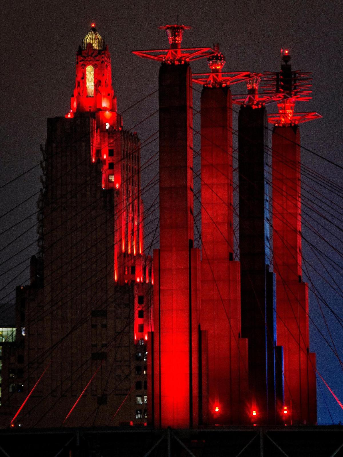 The pylons on Bartle Hall and the Power and Light building glow red to celebrate the success of the Kansas City Chiefs.