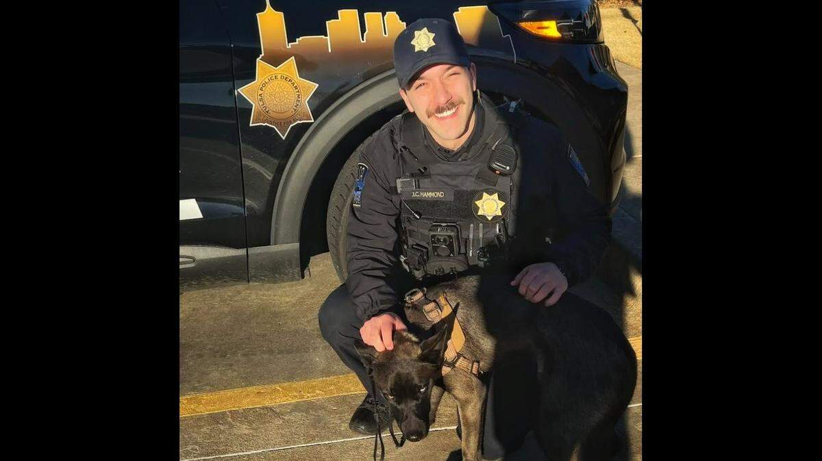 “Tasha Blue” with a Tulsa police officer.
