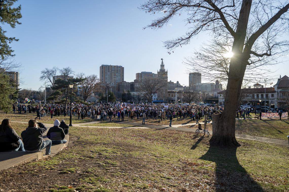 Demonstrators gather at the Mill Creek Park during a vigil for victims of U.S. Immigration and Customs Enforcement on Saturday, Jan. 10, 2026, in Kansas City.