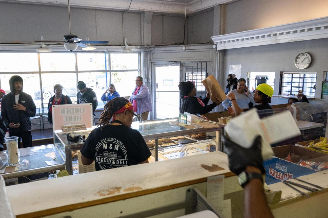 A line begins to form early at M&M Bakery and Delicatessen in Kansas City. M&M Bakery is a family-owned operation that has served Kansas City for 40 years.