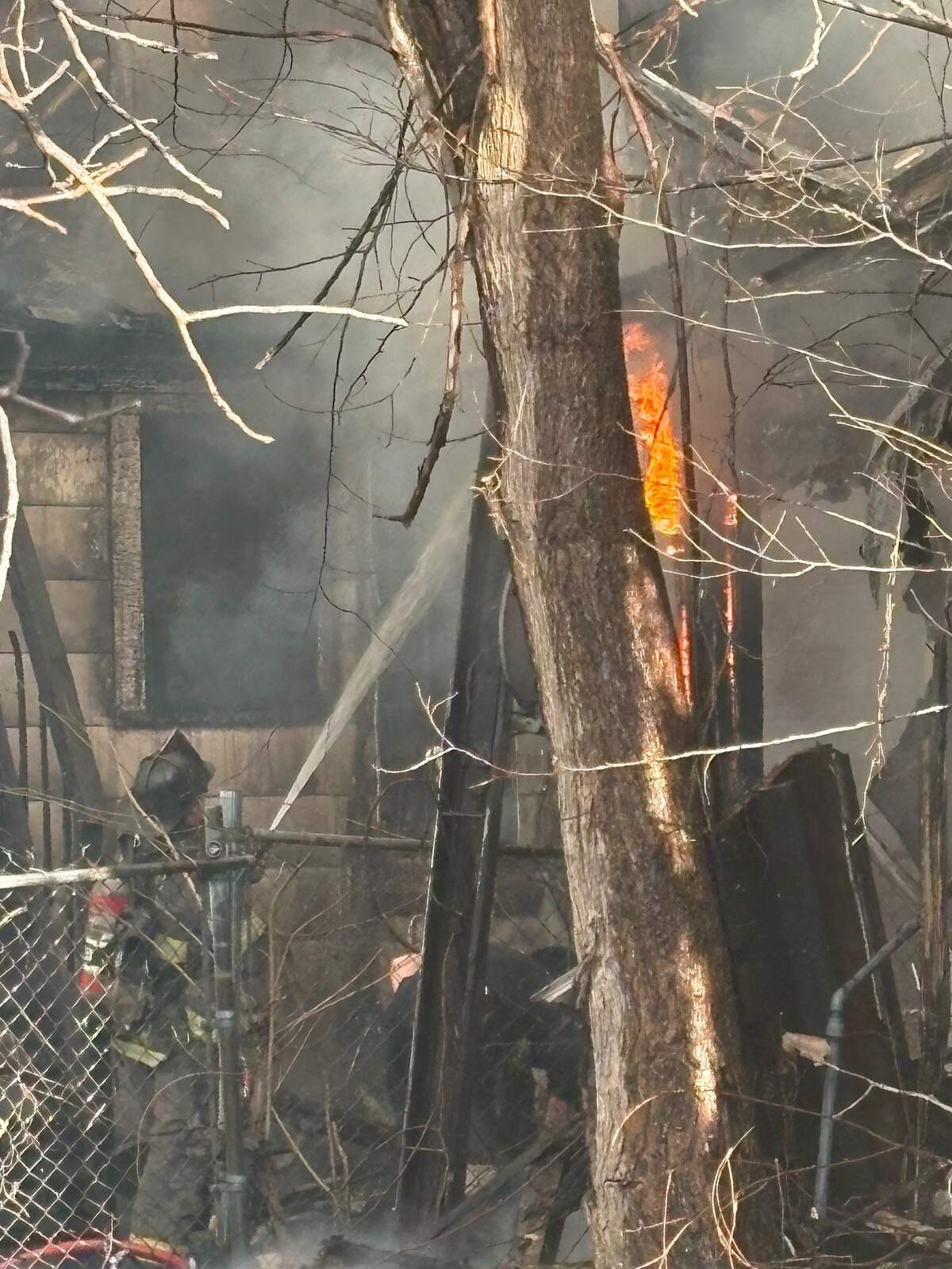 Firefighters battled a blaze at a vacant, two-story house in the 2700 block of East 27th Street early Sunday. No one was injured in the blaze, which damaged neighboring properties.