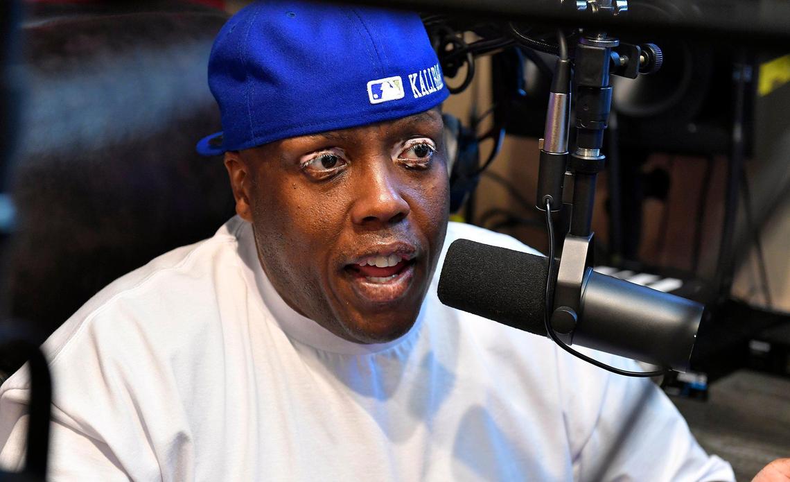 Music artist Krizz Kaliko sits in home studio where he records his music, livestreams and does voice acting work.