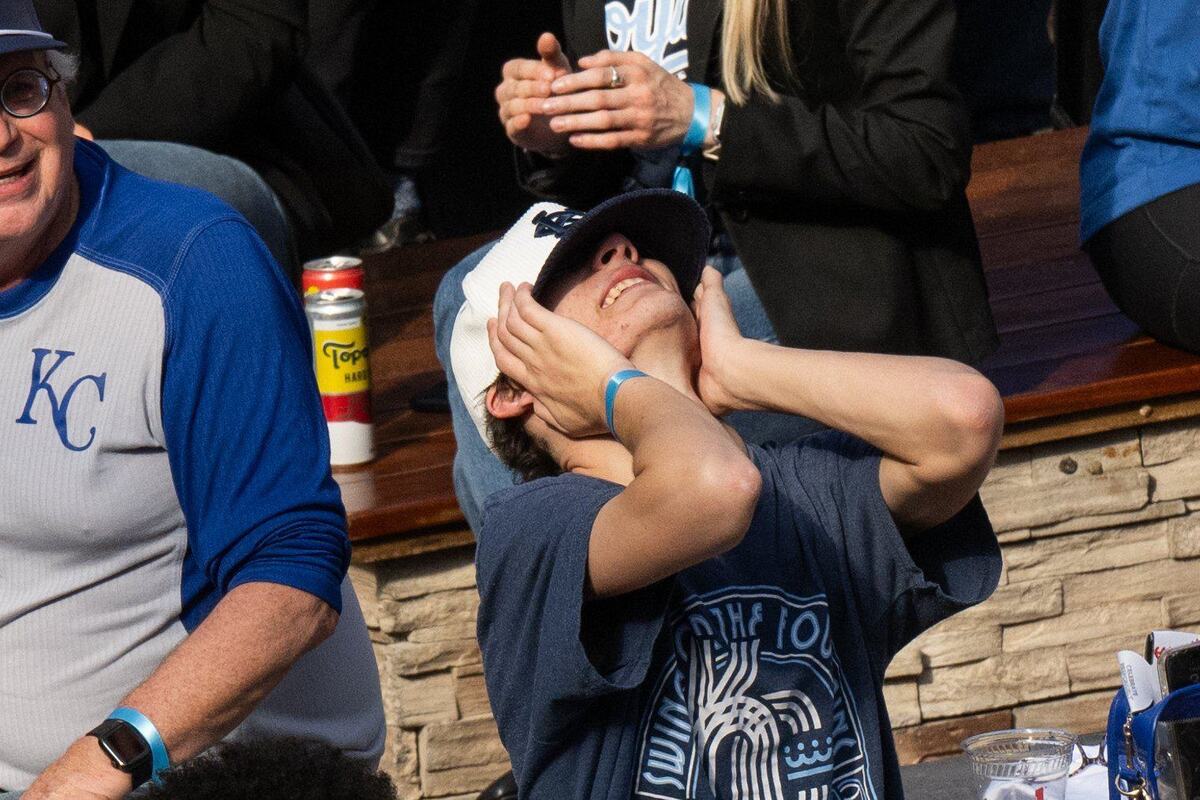 Fans react to the Royals opening playoff game vs. the Baltimore Orioles during a watch party at the Power & Light District on Tuesday, Oct. 1, 2024. The Royals won the game 1-0.