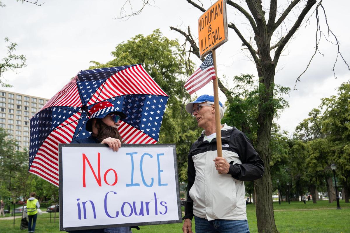 Around 50 protesters gathered outside a federal immigration courthouse in downtown Kansas City on Tuesday, May 27, 2025. People held signs and chanted against Immigration and Customs Enforcement targeting undocumented people appearing in court.