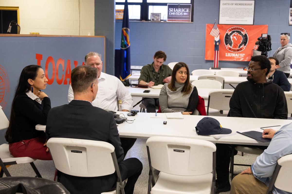 Kansas Rep. Sharice Davids meets with recently fired federal workers at LiUNA Local 1290 Union Hall in Merriam on Friday, Mar. 7, 2025. Kansas City, a major hub for federal employment, is experiencing widespread impacts from government layoffs.