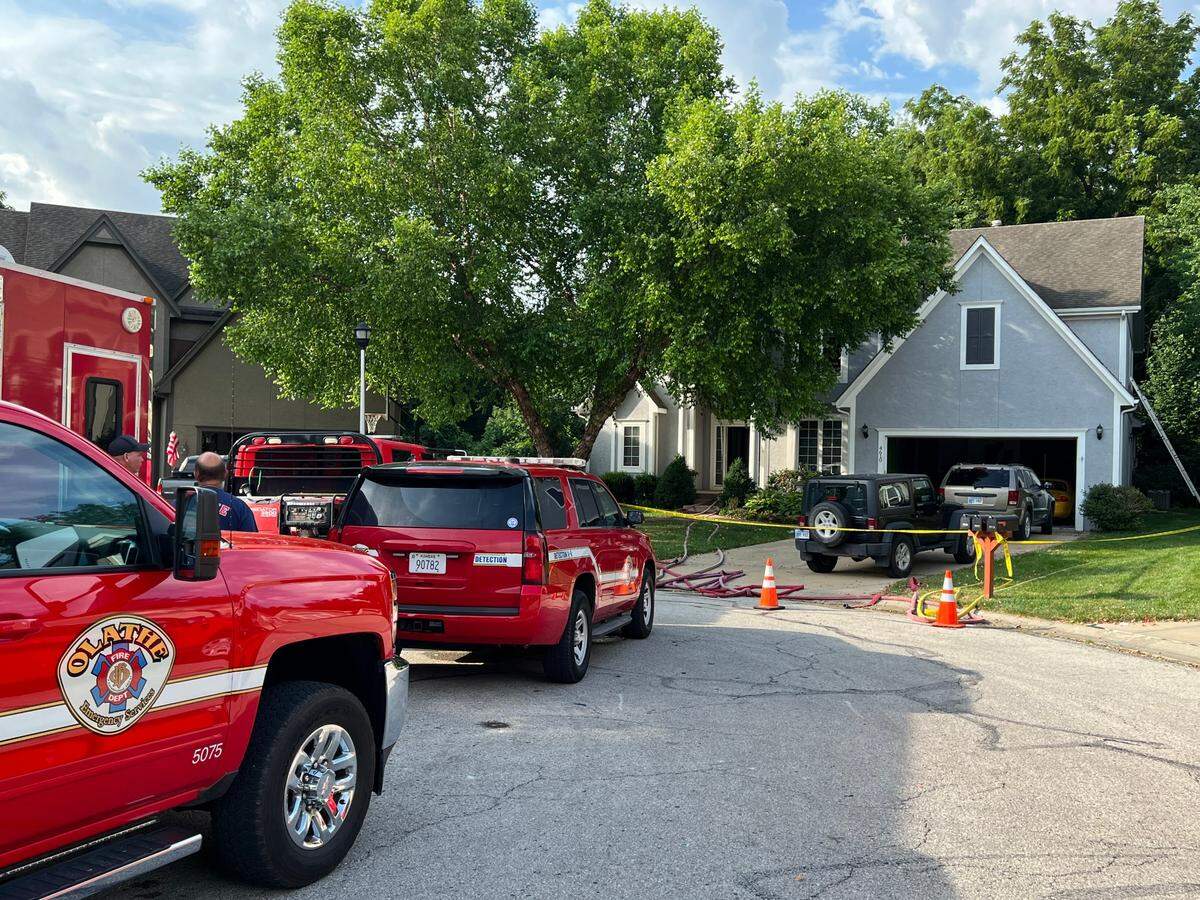 Authorities investigate a house fire near Grove and Silverheel streets in Shawnee.