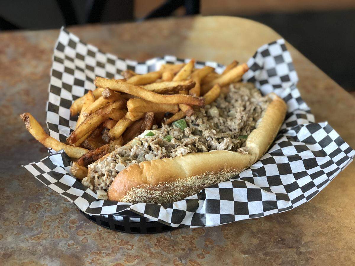 At Jersey Boyz in North Kansas City, the best-selling cheesesteak is the Travolta. It's made with hot pepper cheese, cream cheese, grilled onions and green peppers.