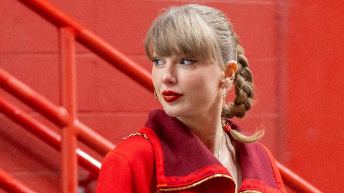 Pop star Taylor Swift walks through a tunnel to attend the Kansas City Chiefs’ game against the Las Vegas Raiders on Friday, Nov. 29, 2024, at GEHA Field at Arrowhead Stadium.