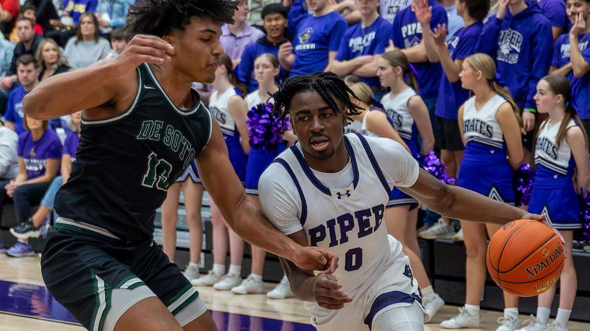 PJ Moore, right, and Piper topped De Soto 49-44 to advance to the Kansas Class 5A boys state tournament in high school basketball.