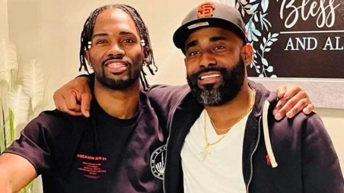 Warner Trotter Jr., right, with his oldest son, Warner Trotter III.