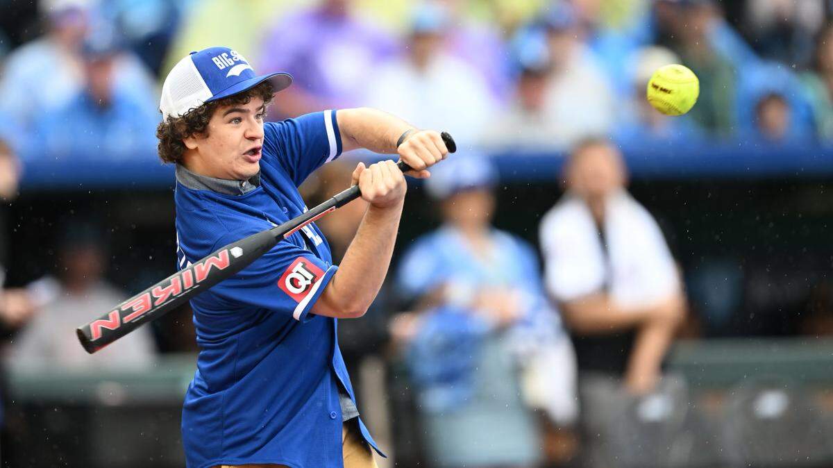 “Stranger Things” star Gaten Matarazzo takes aim at the ball during the Big Slick Celebrity Softball Game.