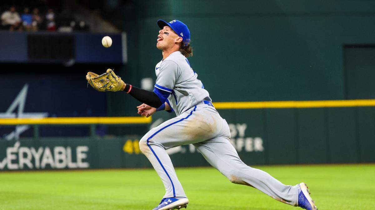 Kansas City Royals shortstop Bobby Witt Jr. (7) makes a running catch during the tenth inning against the Texas Rangers at Globe Life Field on April 11, 2023.