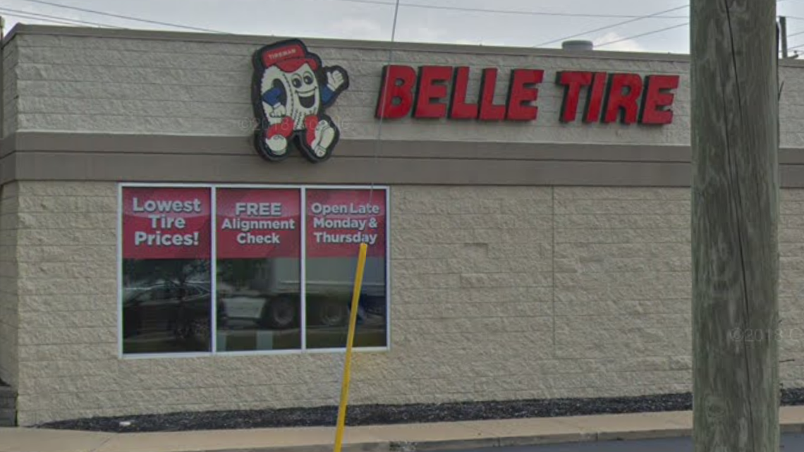 Police say a body was found covered in snow outside the entrance to Belle Tire in Troy.