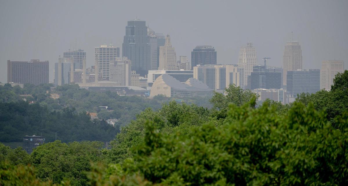 The downtown skyline is covered in a haze of airborne particulates on Monday, June 5, 2023, in Kansas City.