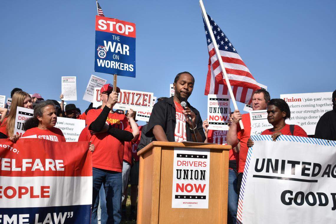 IRIS microtransit driver Darian Hall speaks at a rally announcing drivers’ intention to unionize outside program operator zTrip’s headquarters in Kansas City on Thursday, Oct. 10, 2024.